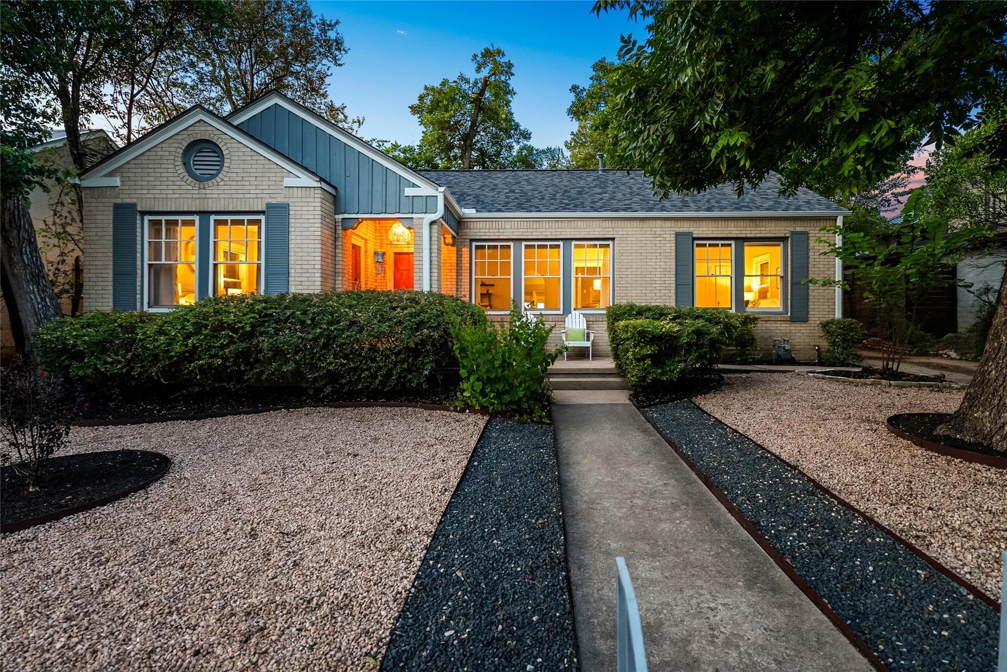 A charming home welcomes with a well-maintained f