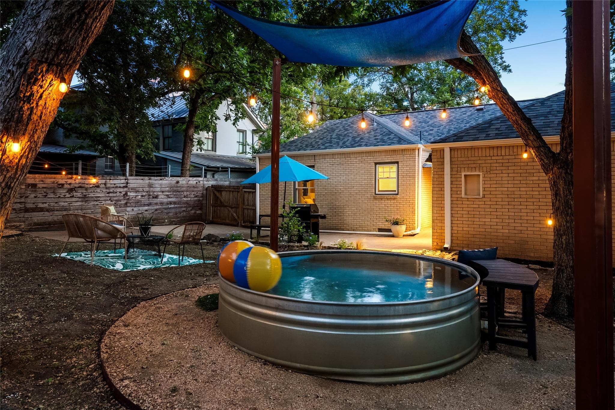 A private backyard oasis features a unique stock