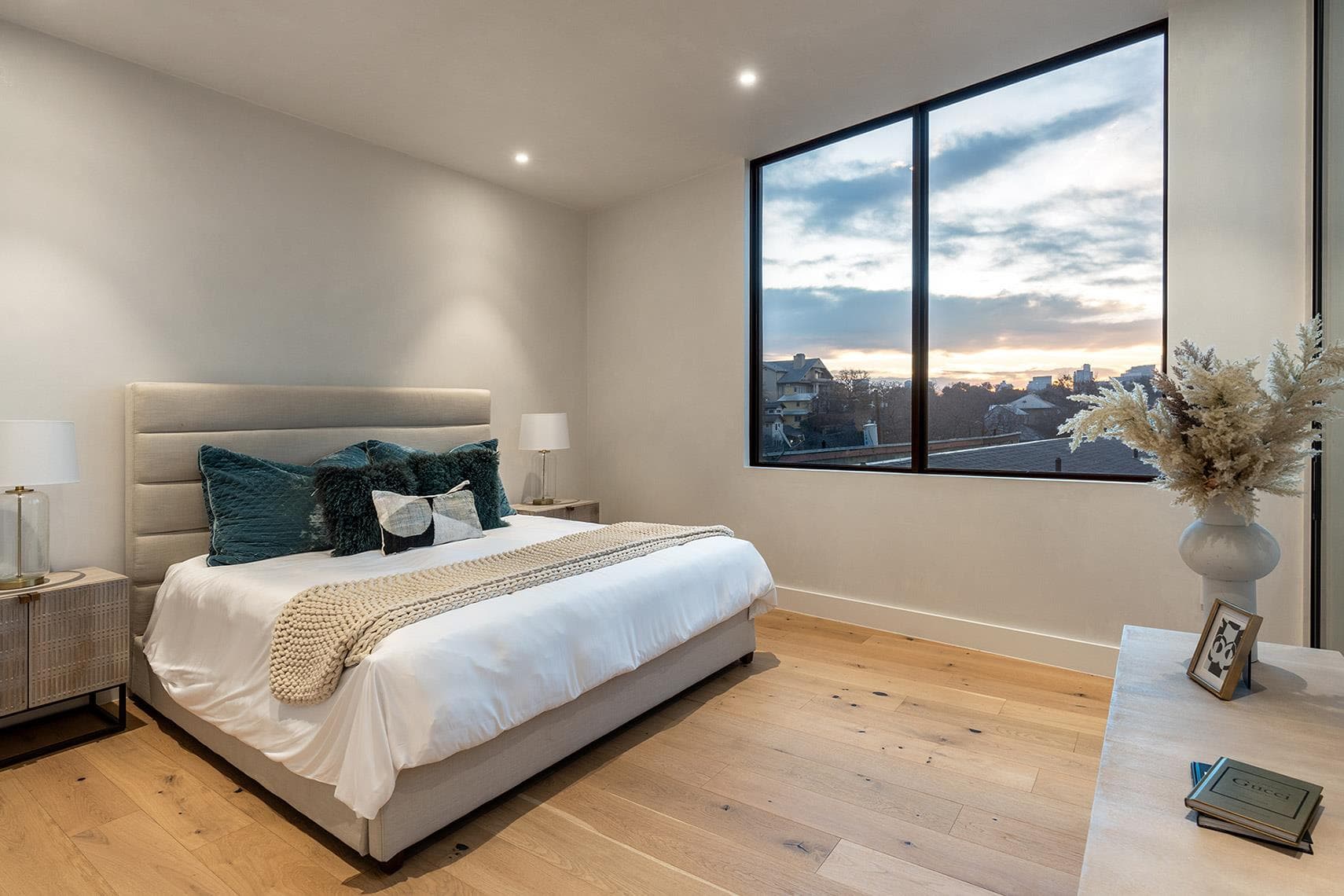 Floor-to-ceiling windows offer captivating city v