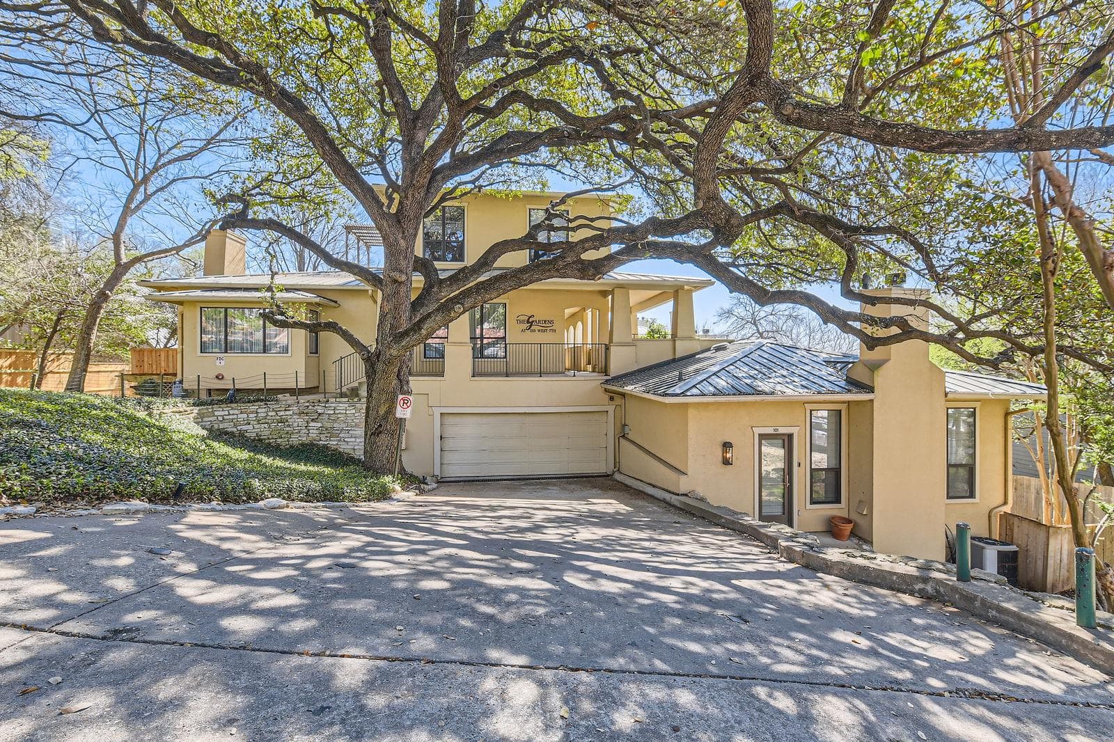 View of front of home featuring stucco siding, dr