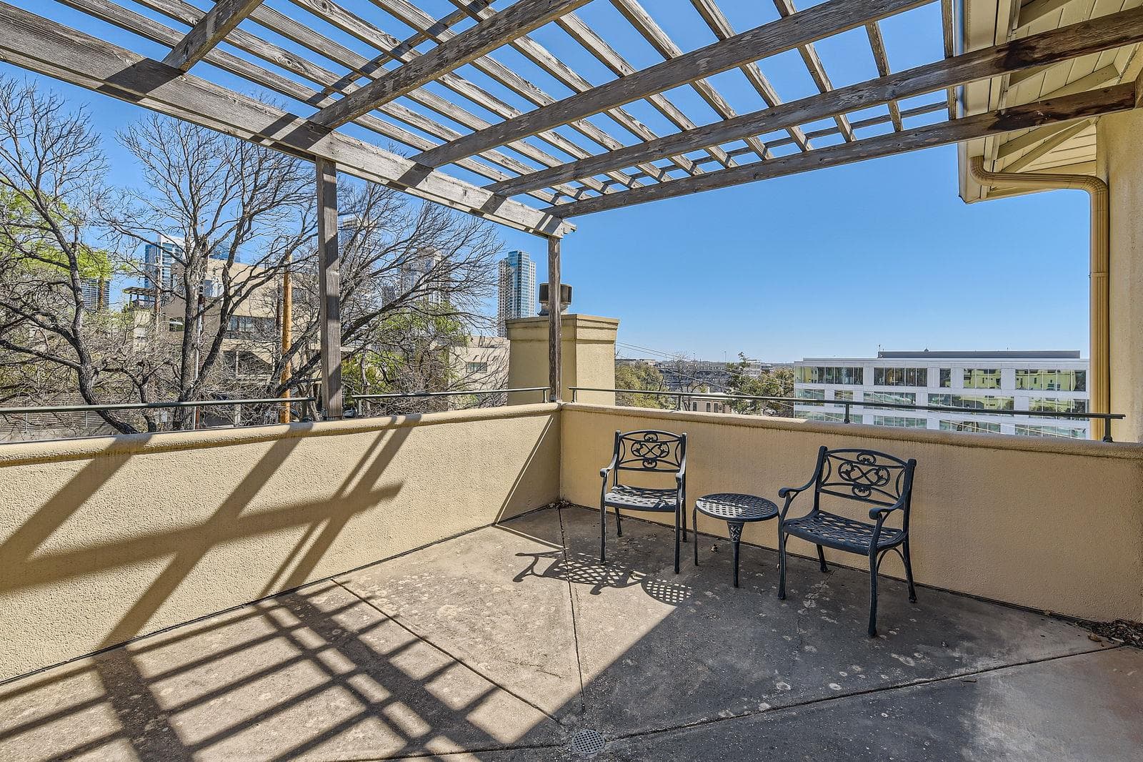 View of patio / terrace with a pergola and a balc